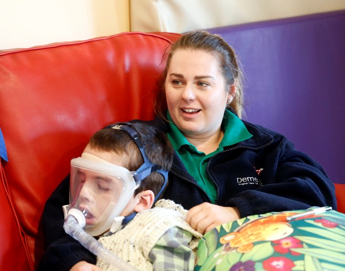 Jack rests on Health Care Assistant, as he received treatment.