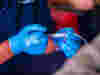 Image of nurse giving medication