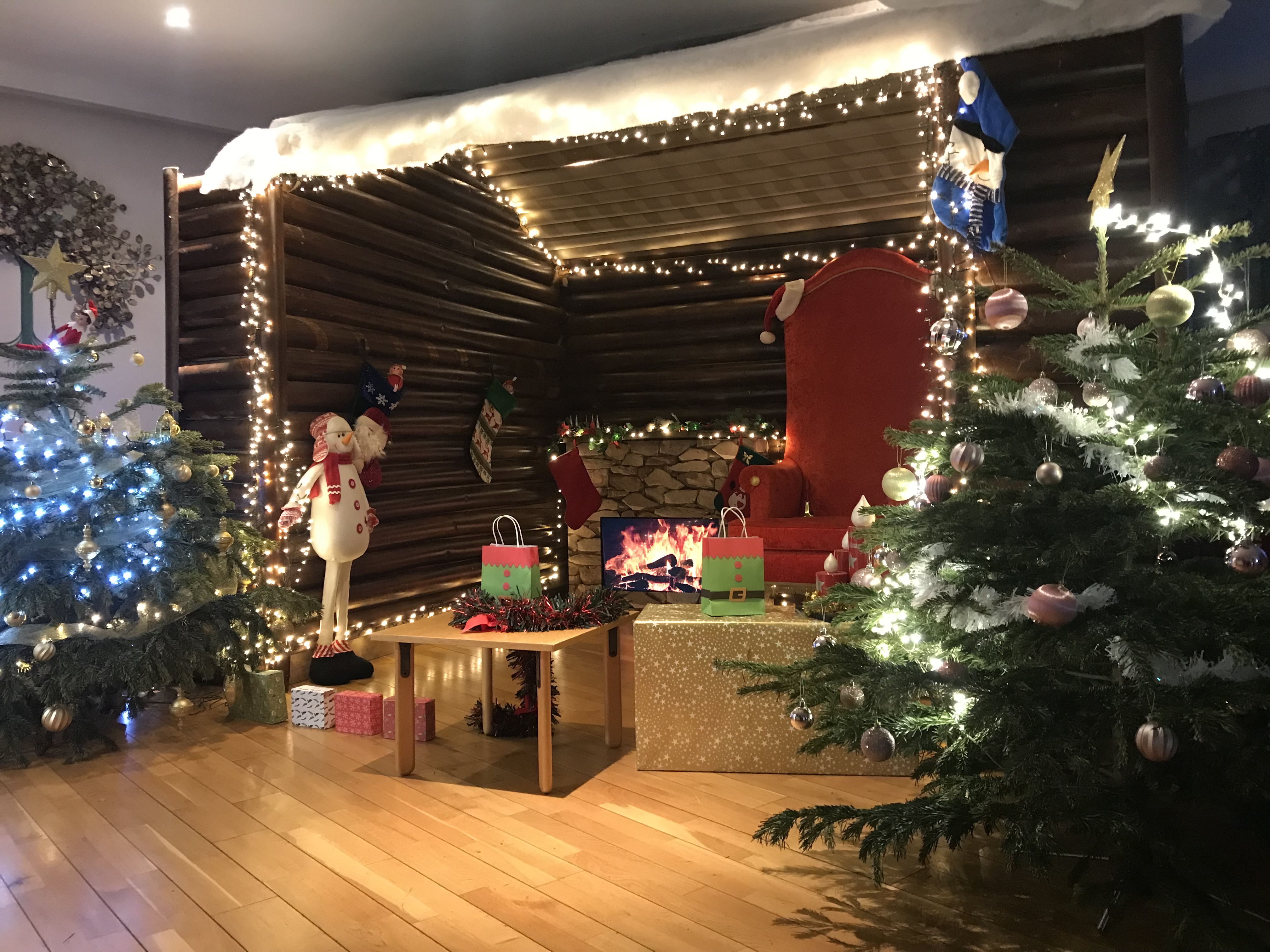 A Christmas grotto, with a chair for Santa and lots of festive decorations.