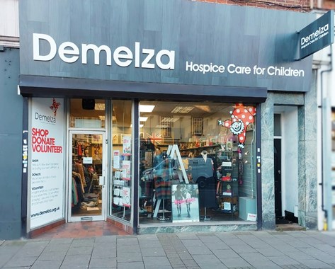 The exterior of a Demelza charity shop.