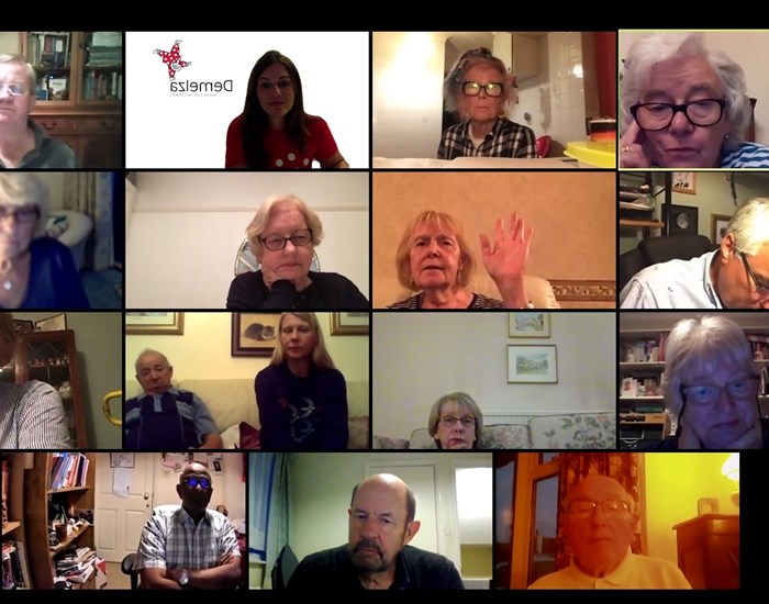 A group come together via Zoom for an online session.