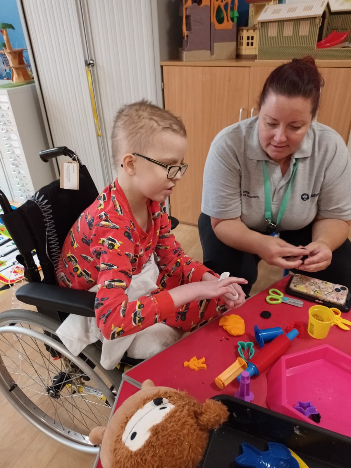 Image of Leo doing crafts with Hettie