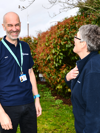 Demelza staff chatting in our Garden of Tranquillity