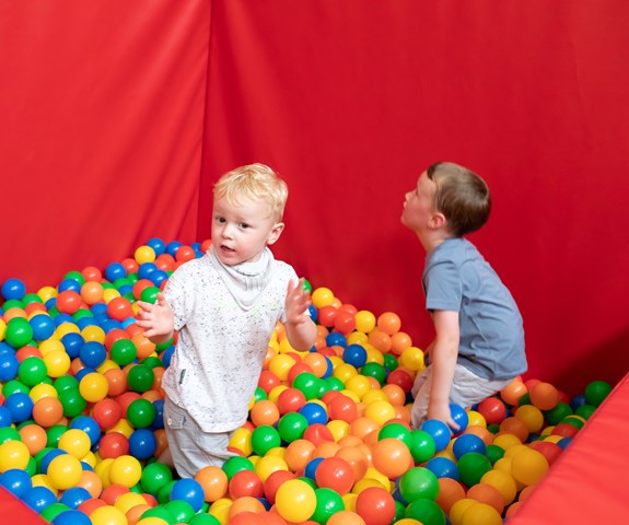 Ralph and his brother in the soft play ball pit at Demelza Kent.