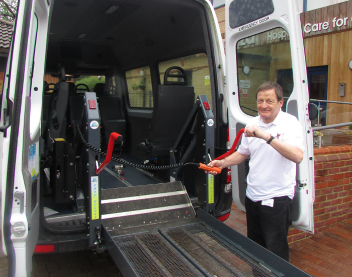 A practical support driver operates Demelza's wheelchair accessible vehicle.