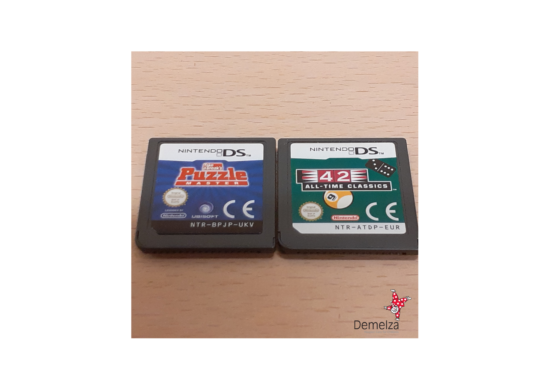 Two DS Lite games in cases
