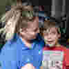 A Demelza nurse with a young boy during a community care visit