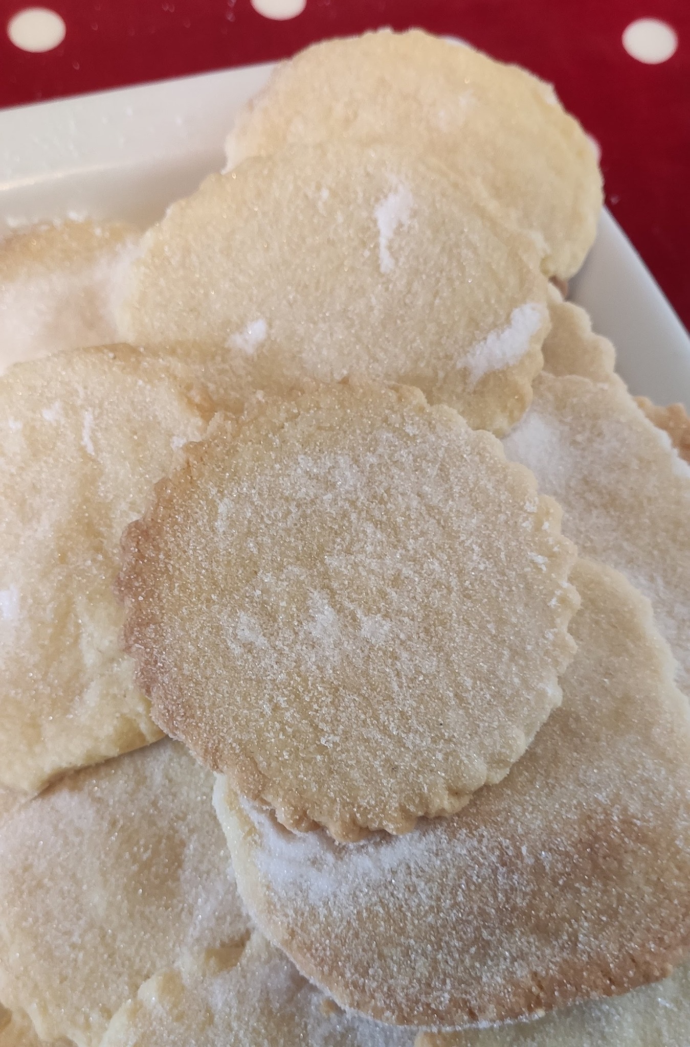 A pile of sugar covered shortbread biscuits.