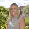 Hayley Clark, Director of People and Culture, stands in Demelza’s hospice gardens