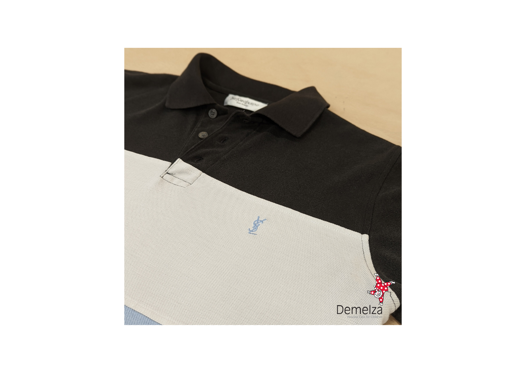 Tri-colour polo: Black, white and blue blocks with YSL embroidered emblem to chest