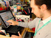 A retail volunteer behind the till at the Sheerness Children's shop