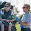 Nurse and young person outside
