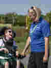 Young person and staff outside