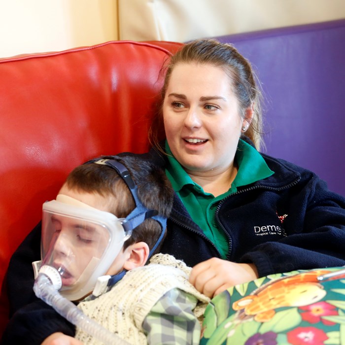 Jack rests on Health Care Assistant, as he received treatment.