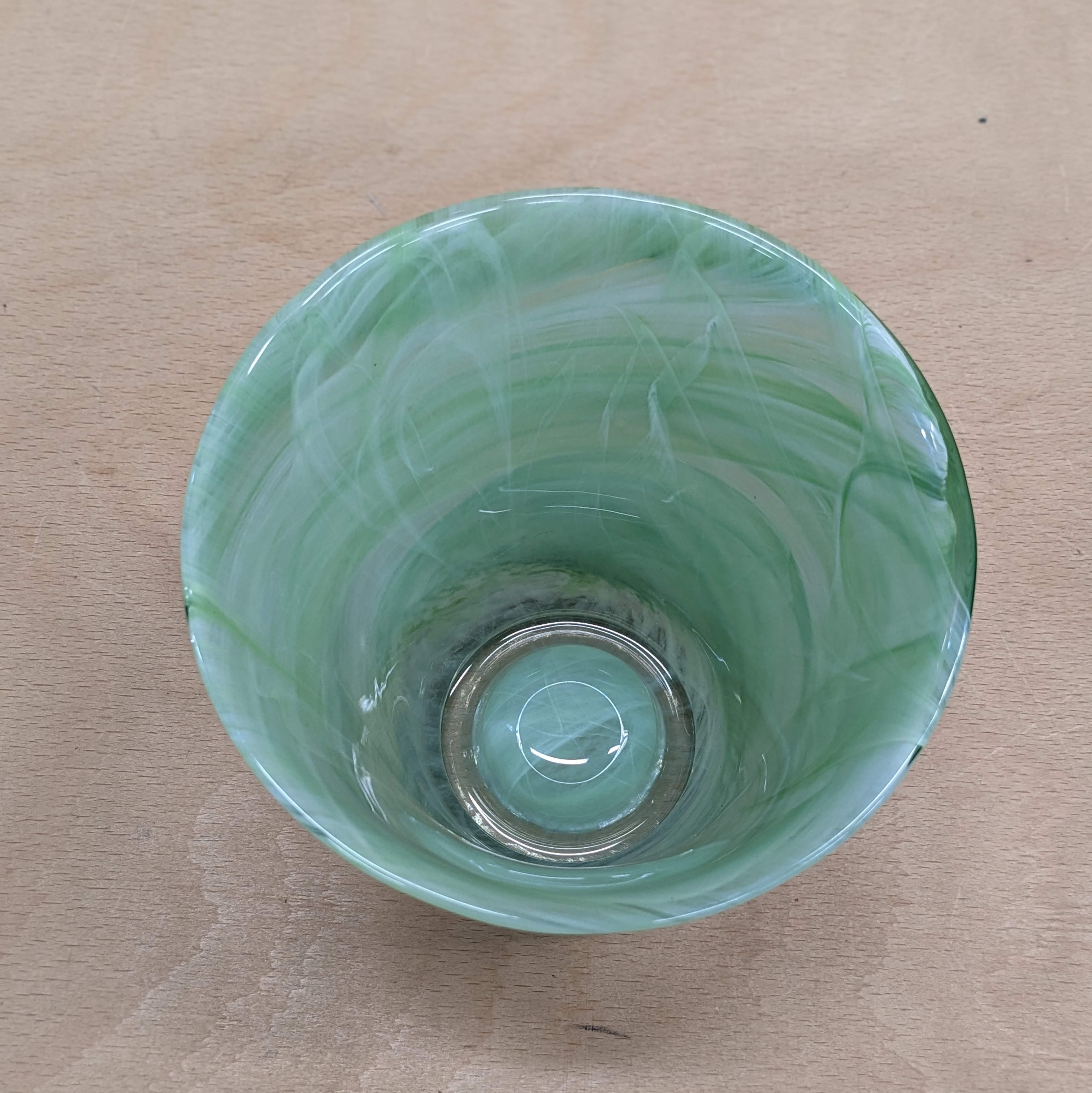 Green glass marbled effect pattern bottom base dome view