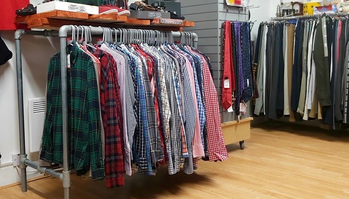 A clothing rail with men's shirts.