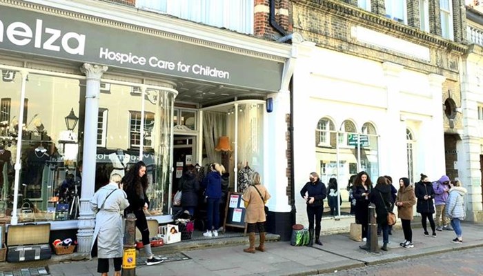 People queueing outside Demelza's Rochester charity shop.