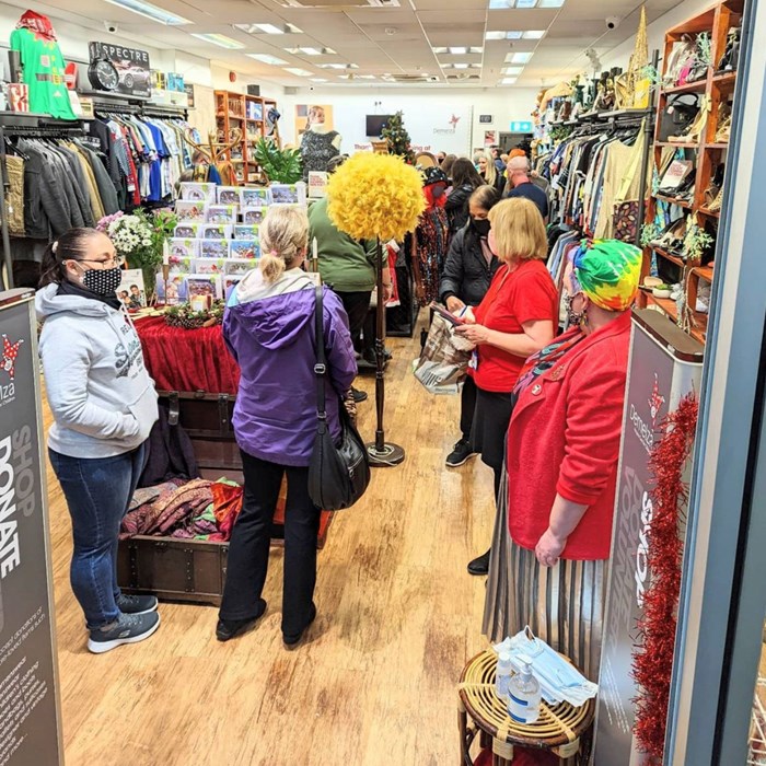 Customers enjoying browsing in Demelza's Hempstead Valley Charity Shop.
